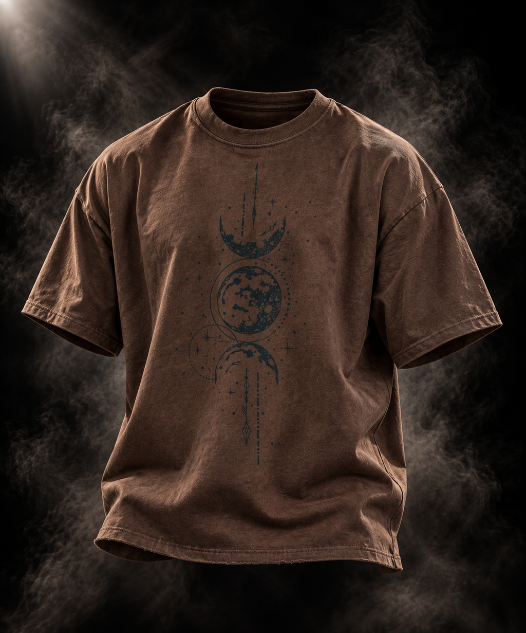 Celestial boxy fit unisex brown T-shirt front close-up showing celestial artwork and ribbed neckline