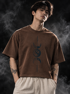 Celestial boxy fit unisex brown T-shirt styled on a male model with wide-leg trousers