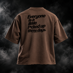 F*cked Up Boxy Fit Unisex T-shirt in brown, back graphic reading Everyone is a little f*cked up these days