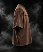 F*cked Up Boxy Fit Unisex T-shirt in brown, front three-quarter view with DUSTOFGODS chest logo