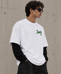Kid with a Dream Oversized Doctor Sleeve Unisex T-Shirt by DUSTOFGODS, white oversized tee with green airplane chest graphic and black long sleeves.