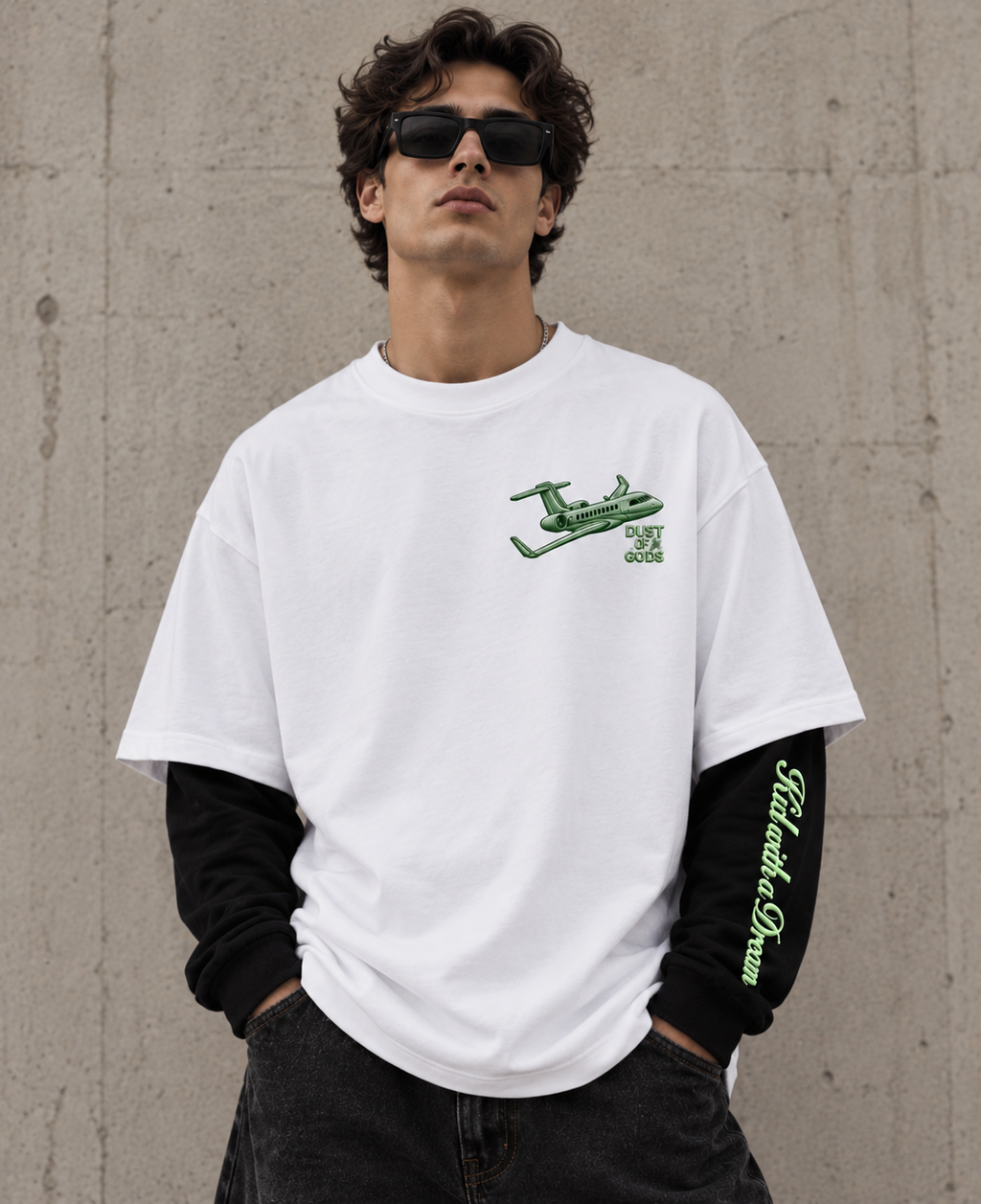 Kid with a Dream Oversized Doctor Sleeve Unisex T-Shirt by DUSTOFGODS, close front view showing the green airplane chest graphic and oversized silhouette.