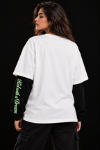 Kid with a Dream Oversized Doctor Sleeve Unisex T-Shirt by DUSTOFGODS, white oversized tee shown from the back with black sleeves and neon green sleeve lettering.