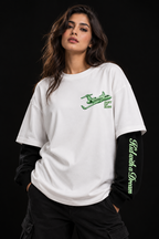 Kid with a Dream Oversized Doctor Sleeve Unisex T-Shirt by DUSTOFGODS, white oversized tee on a model with green airplane chest graphic and black contrast sleeves.