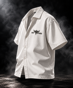 DUST OF GODS Originals heavyweight boxy shirt in off white at an angled front view