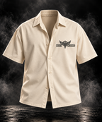 DUST OF GODS Originals heavyweight boxy shirt in off white with embroidered winged chest emblem, front view