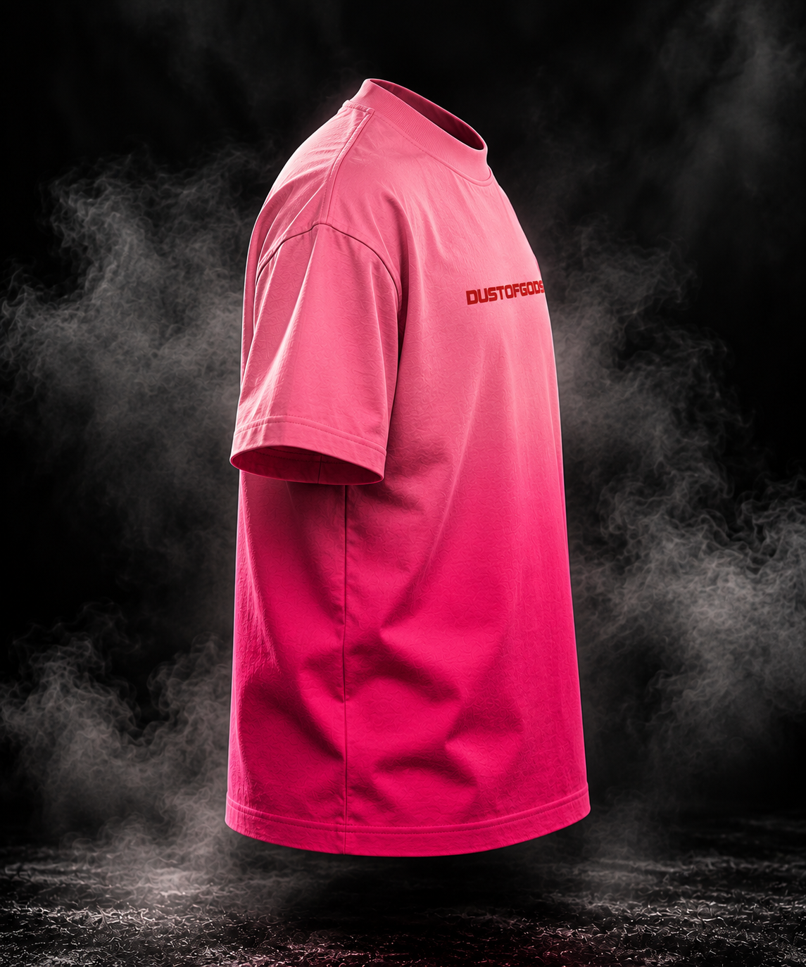 Side view of DUSTOFGODS Red Flag pink sunfade ombre boxy fit unisex t-shirt showing relaxed sleeve and side seam