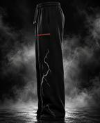 Thunder Heavyweight Sweatpants black side view with lightning graphic and red DUST OF GODS logo