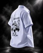 Venice Blue Boxy Fit Shirt by DUSTOFGODS, straight back studio view with Venice Italia bridge graphic